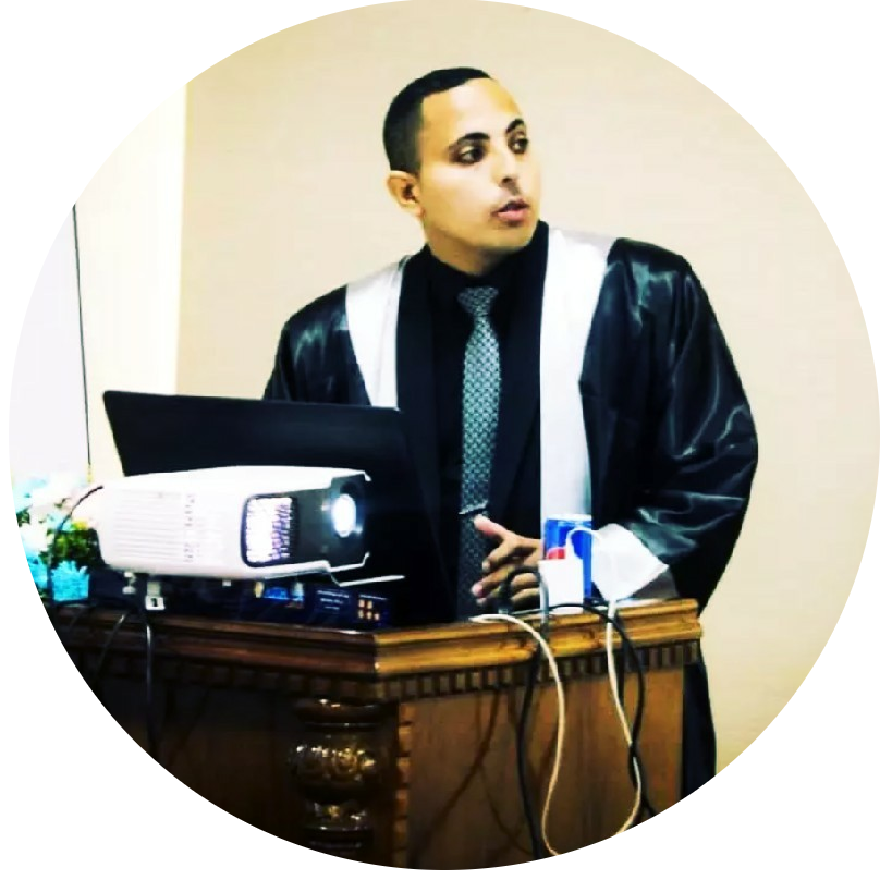 Mohamed Atef speaking at a lectern
